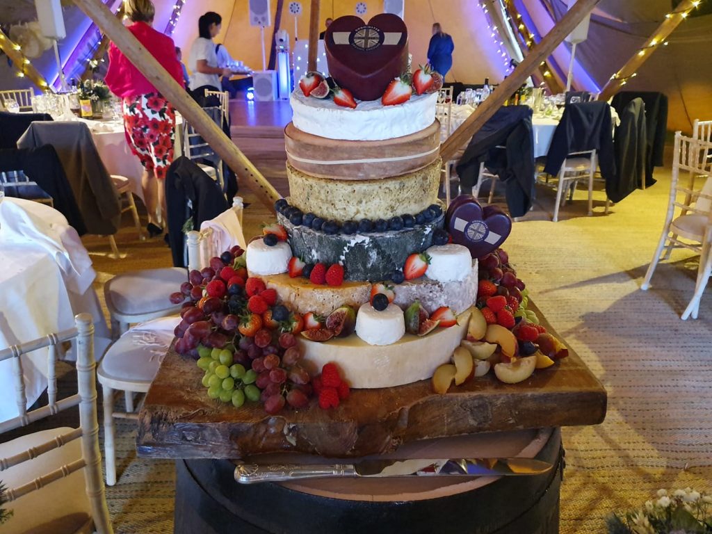A wedding cake made out of cheese by KB Catering